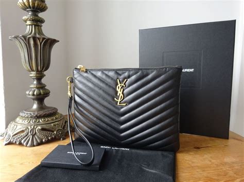 ysl medium monogram matelassé leather wristlet